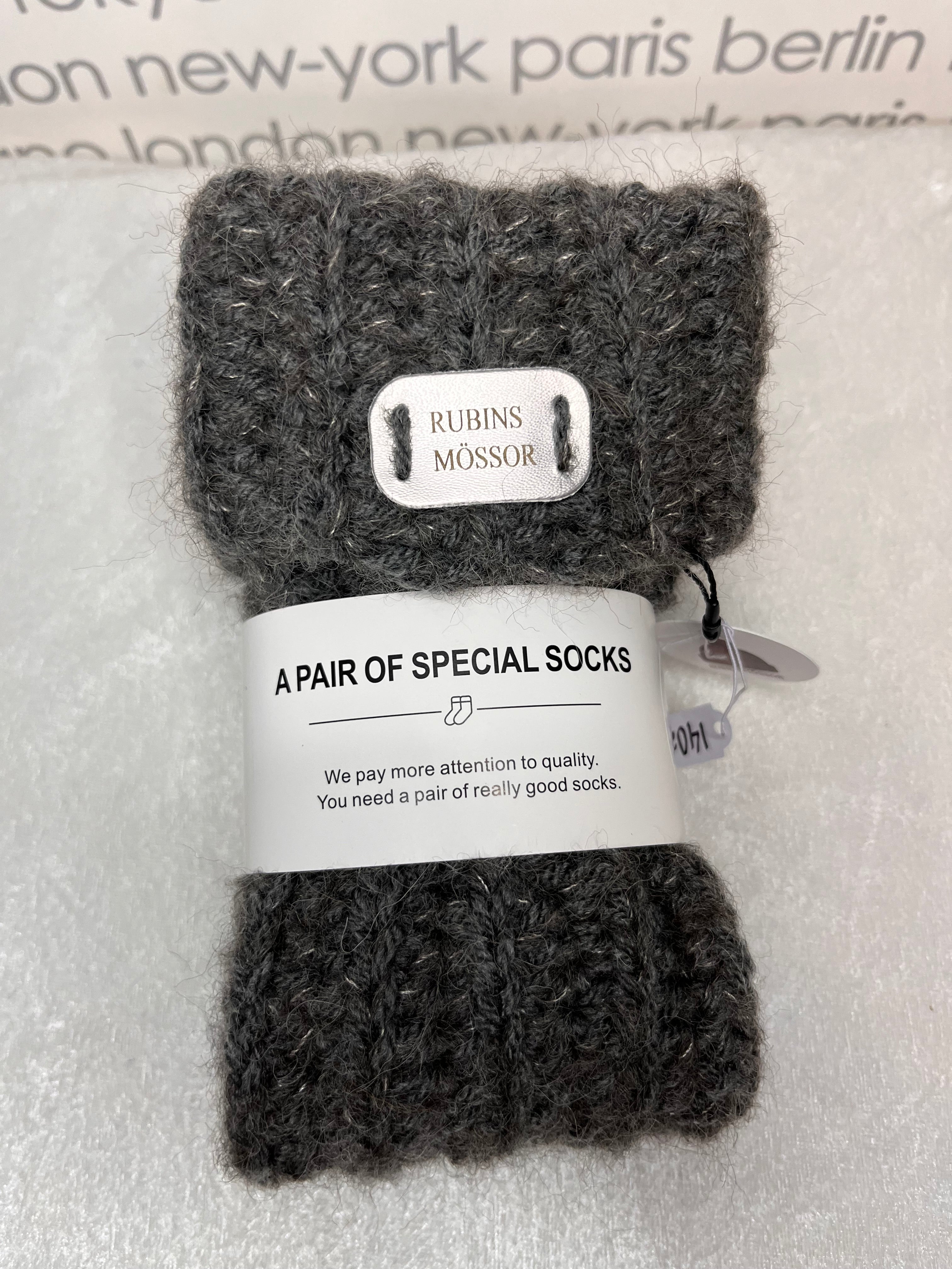 Sockor i ull, polyester, alpacka, silke och akryl
